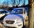 Серый Киа Каренс, объемом двигателя 2 л и пробегом 230 тыс. км за 5200 $, фото 1 на Automoto.ua