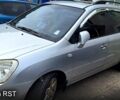 Серый Киа Каренс, объемом двигателя 2 л и пробегом 215 тыс. км за 9300 $, фото 1 на Automoto.ua
