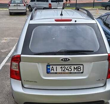Сірий Кіа Каренс, об'ємом двигуна 2 л та пробігом 215 тис. км за 9300 $, фото 2 на Automoto.ua