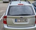 Сірий Кіа Каренс, об'ємом двигуна 2 л та пробігом 215 тис. км за 9300 $, фото 2 на Automoto.ua