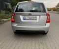 Серый Киа Каренс, объемом двигателя 2 л и пробегом 197 тыс. км за 6499 $, фото 5 на Automoto.ua