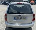 Серый Киа Каренс, объемом двигателя 2 л и пробегом 207 тыс. км за 5999 $, фото 5 на Automoto.ua