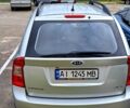 Серый Киа Каренс, объемом двигателя 2 л и пробегом 215 тыс. км за 9300 $, фото 1 на Automoto.ua