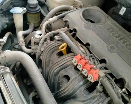 Сірий Кіа Каренс, об'ємом двигуна 2 л та пробігом 229 тис. км за 7300 $, фото 19 на Automoto.ua