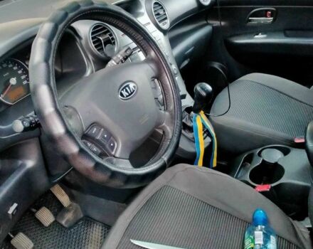 Сірий Кіа Каренс, об'ємом двигуна 2 л та пробігом 229 тис. км за 7300 $, фото 7 на Automoto.ua