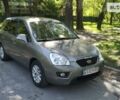 Сірий Кіа Каренс, об'ємом двигуна 2 л та пробігом 159 тис. км за 9300 $, фото 31 на Automoto.ua