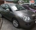 Сірий Кіа Каренс, об'ємом двигуна 2 л та пробігом 235 тис. км за 7500 $, фото 1 на Automoto.ua