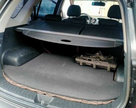 Сірий Кіа Каренс, об'ємом двигуна 2 л та пробігом 229 тис. км за 7300 $, фото 11 на Automoto.ua