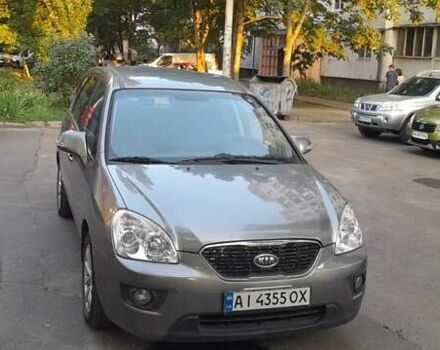 Сірий Кіа Каренс, об'ємом двигуна 2 л та пробігом 235 тис. км за 7500 $, фото 3 на Automoto.ua