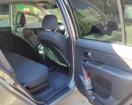 Сірий Кіа Каренс, об'ємом двигуна 2 л та пробігом 90 тис. км за 7700 $, фото 6 на Automoto.ua