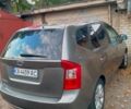 Сірий Кіа Каренс, об'ємом двигуна 2 л та пробігом 229 тис. км за 7300 $, фото 13 на Automoto.ua