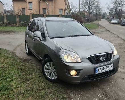 Серый Киа Каренс, объемом двигателя 2 л и пробегом 49 тыс. км за 10000 $, фото 2 на Automoto.ua