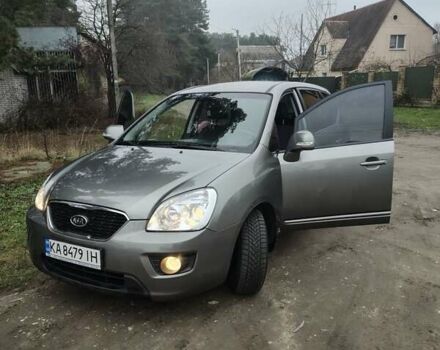 Серый Киа Каренс, объемом двигателя 2 л и пробегом 49 тыс. км за 10000 $, фото 8 на Automoto.ua