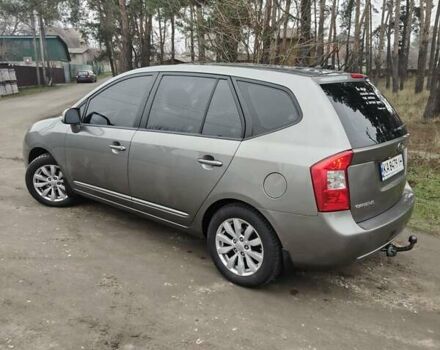 Серый Киа Каренс, объемом двигателя 2 л и пробегом 49 тыс. км за 10000 $, фото 4 на Automoto.ua