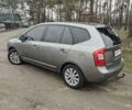 Серый Киа Каренс, объемом двигателя 2 л и пробегом 49 тыс. км за 10000 $, фото 4 на Automoto.ua