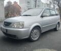 Сірий Кіа Каренс, об'ємом двигуна 2 л та пробігом 295 тис. км за 3155 $, фото 1 на Automoto.ua