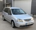 Сірий Кіа Каренс, об'ємом двигуна 2 л та пробігом 258 тис. км за 2806 $, фото 1 на Automoto.ua