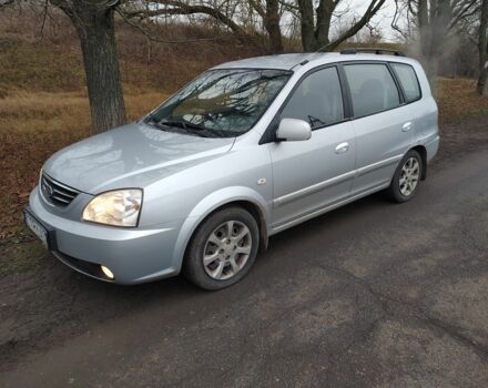 Серый Киа Каренс, объемом двигателя 2 л и пробегом 220 тыс. км за 1850 $, фото 1 на Automoto.ua