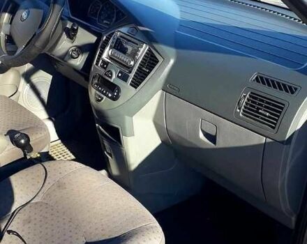 Серый Киа Каренс, объемом двигателя 1.6 л и пробегом 267 тыс. км за 4200 $, фото 8 на Automoto.ua