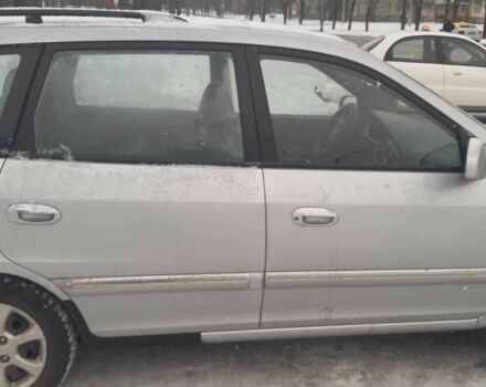 Серый Киа Каренс, объемом двигателя 1.6 л и пробегом 267 тыс. км за 4200 $, фото 1 на Automoto.ua