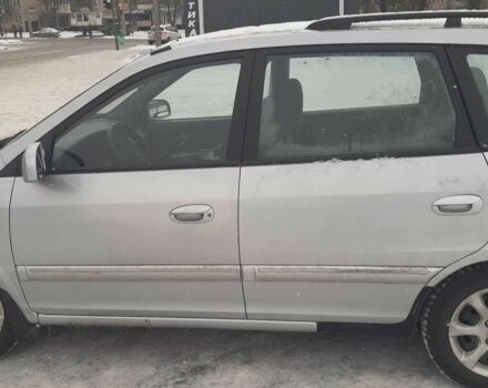 Серый Киа Каренс, объемом двигателя 1.6 л и пробегом 267 тыс. км за 4200 $, фото 3 на Automoto.ua