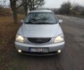 Серый Киа Каренс, объемом двигателя 2 л и пробегом 220 тыс. км за 1850 $, фото 1 на Automoto.ua