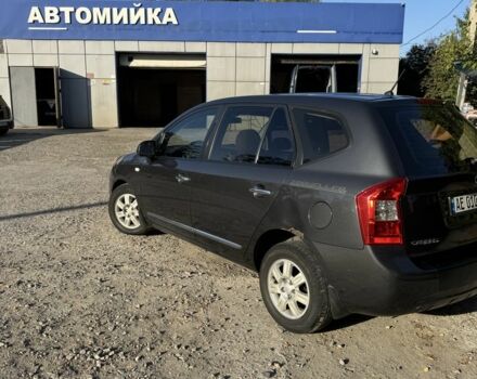 Серый Киа Каренс, объемом двигателя 2 л и пробегом 273 тыс. км за 5000 $, фото 4 на Automoto.ua