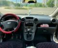 Сірий Кіа Каренс, об'ємом двигуна 2 л та пробігом 212 тис. км за 5500 $, фото 4 на Automoto.ua