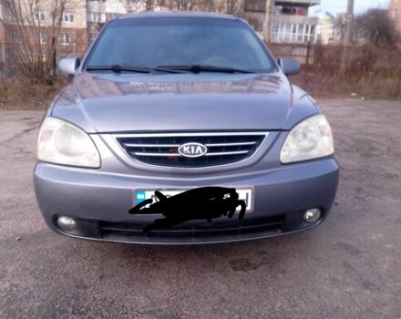 Сірий Кіа Каренс, об'ємом двигуна 2 л та пробігом 270 тис. км за 4200 $, фото 1 на Automoto.ua