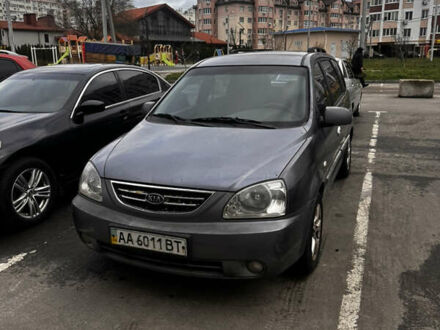 Серый Киа Каренс, объемом двигателя 1.8 л и пробегом 300 тыс. км за 2600 $, фото 1 на Automoto.ua