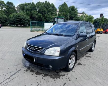 Серый Киа Каренс, объемом двигателя 2 л и пробегом 265 тыс. км за 2100 $, фото 1 на Automoto.ua