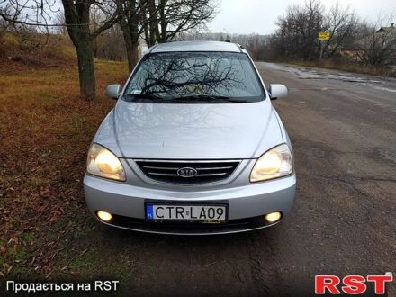 Серый Киа Каренс, объемом двигателя 2 л и пробегом 220 тыс. км за 1850 $, фото 1 на Automoto.ua