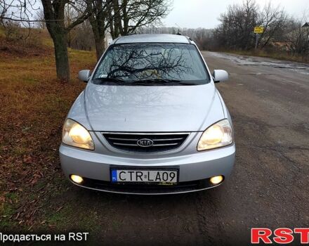 Серый Киа Каренс, объемом двигателя 2 л и пробегом 220 тыс. км за 1850 $, фото 1 на Automoto.ua