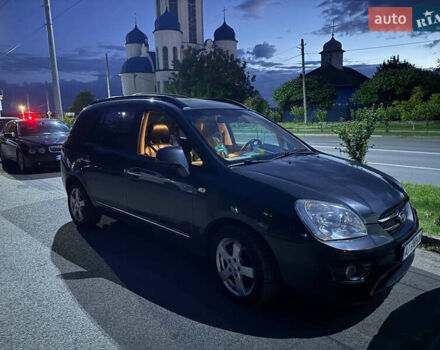 Серый Киа Каренс, объемом двигателя 2 л и пробегом 250 тыс. км за 6000 $, фото 1 на Automoto.ua