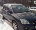 Сірий Кіа Каренс, об'ємом двигуна 2 л та пробігом 197 тис. км за 7000 $, фото 1 на Automoto.ua