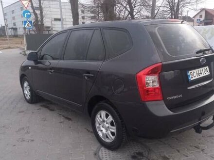 Серый Киа Каренс, объемом двигателя 2 л и пробегом 258 тыс. км за 5200 $, фото 1 на Automoto.ua