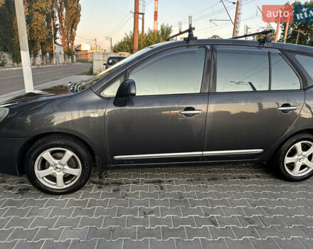 Сірий Кіа Каренс, об'ємом двигуна 2 л та пробігом 317 тис. км за 4500 $, фото 1 на Automoto.ua