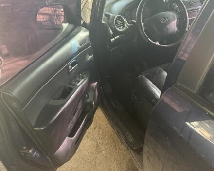 Синий Киа Каренс, объемом двигателя 2 л и пробегом 270 тыс. км за 6100 $, фото 4 на Automoto.ua