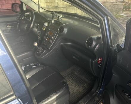 Синий Киа Каренс, объемом двигателя 2 л и пробегом 270 тыс. км за 6100 $, фото 5 на Automoto.ua