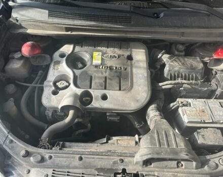 Синий Киа Каренс, объемом двигателя 2 л и пробегом 270 тыс. км за 6100 $, фото 2 на Automoto.ua