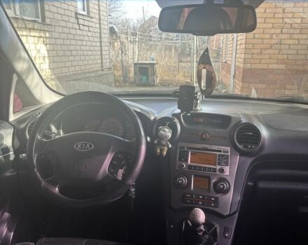 Синий Киа Каренс, объемом двигателя 2 л и пробегом 270 тыс. км за 6100 $, фото 3 на Automoto.ua