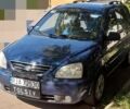 Синий Киа Каренс, объемом двигателя 1.8 л и пробегом 290 тыс. км за 1667 $, фото 1 на Automoto.ua