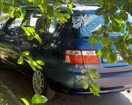 Синий Киа Каренс, объемом двигателя 1.8 л и пробегом 290 тыс. км за 1667 $, фото 3 на Automoto.ua