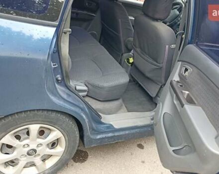 Синій Кіа Каренс, об'ємом двигуна 1.79 л та пробігом 313 тис. км за 2700 $, фото 5 на Automoto.ua