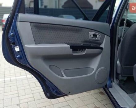 Синий Киа Каренс, объемом двигателя 2 л и пробегом 190 тыс. км за 4800 $, фото 16 на Automoto.ua