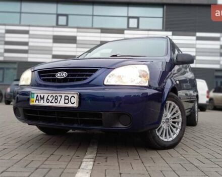 Синий Киа Каренс, объемом двигателя 2 л и пробегом 190 тыс. км за 4800 $, фото 5 на Automoto.ua