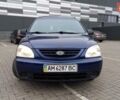 Синий Киа Каренс, объемом двигателя 2 л и пробегом 190 тыс. км за 4800 $, фото 2 на Automoto.ua