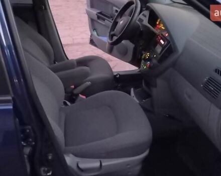 Синий Киа Каренс, объемом двигателя 2 л и пробегом 190 тыс. км за 4700 $, фото 18 на Automoto.ua