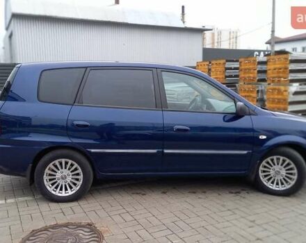 Синий Киа Каренс, объемом двигателя 2 л и пробегом 190 тыс. км за 4800 $, фото 1 на Automoto.ua
