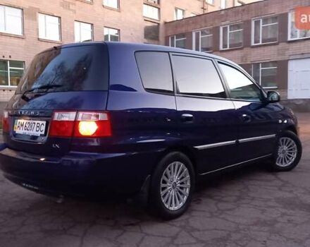 Синий Киа Каренс, объемом двигателя 2 л и пробегом 190 тыс. км за 4700 $, фото 7 на Automoto.ua